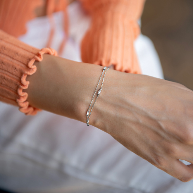 Двойна гривна от бяло злато с камъни циркон