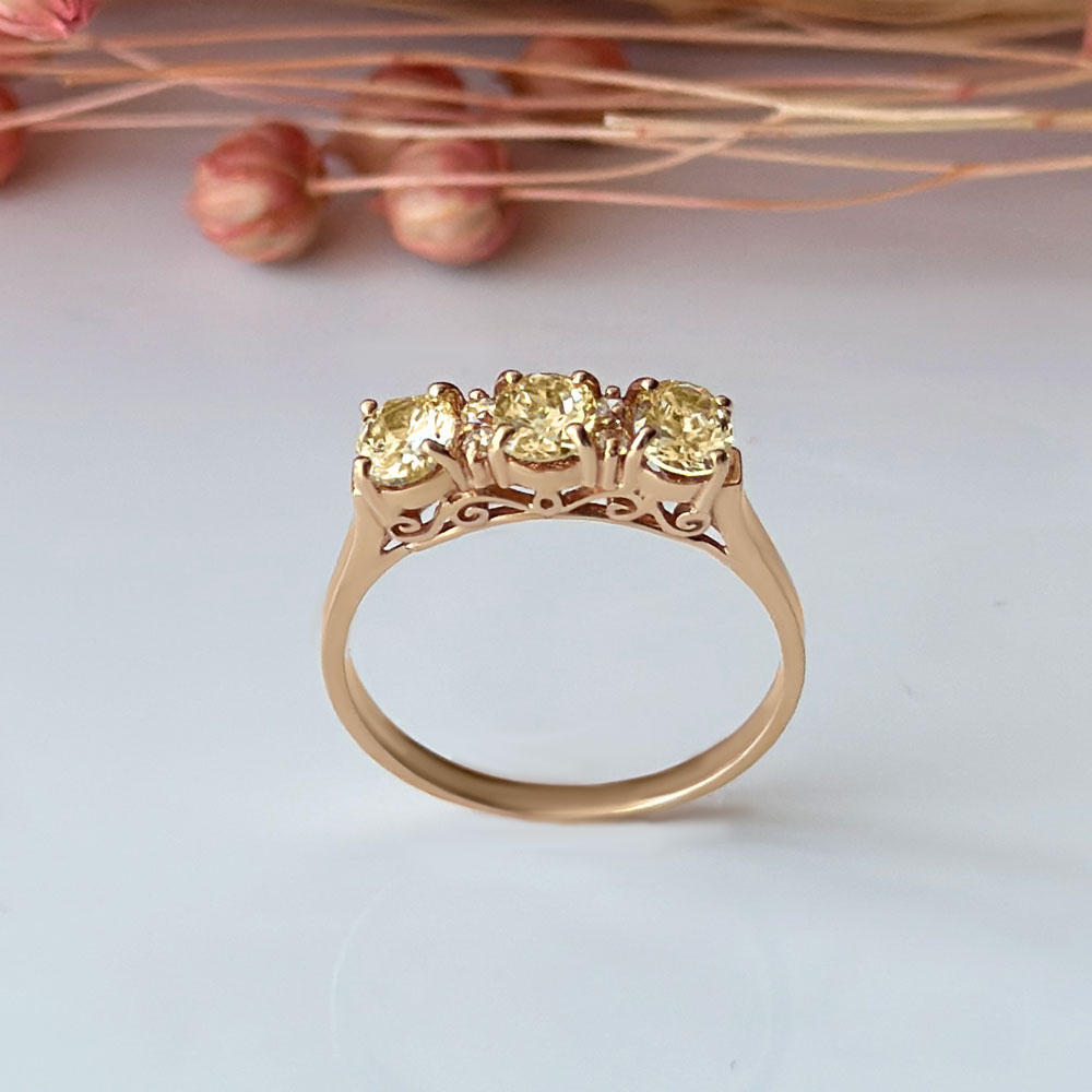 Пръстен розово злато с три камъка цитрин